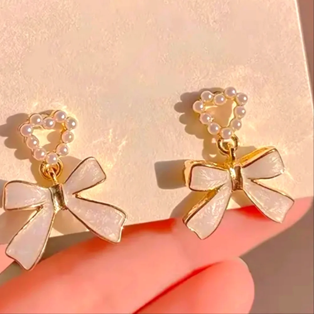 Sparkling Heart Shape Pearl Bow Earrings - Picture 2 of 3